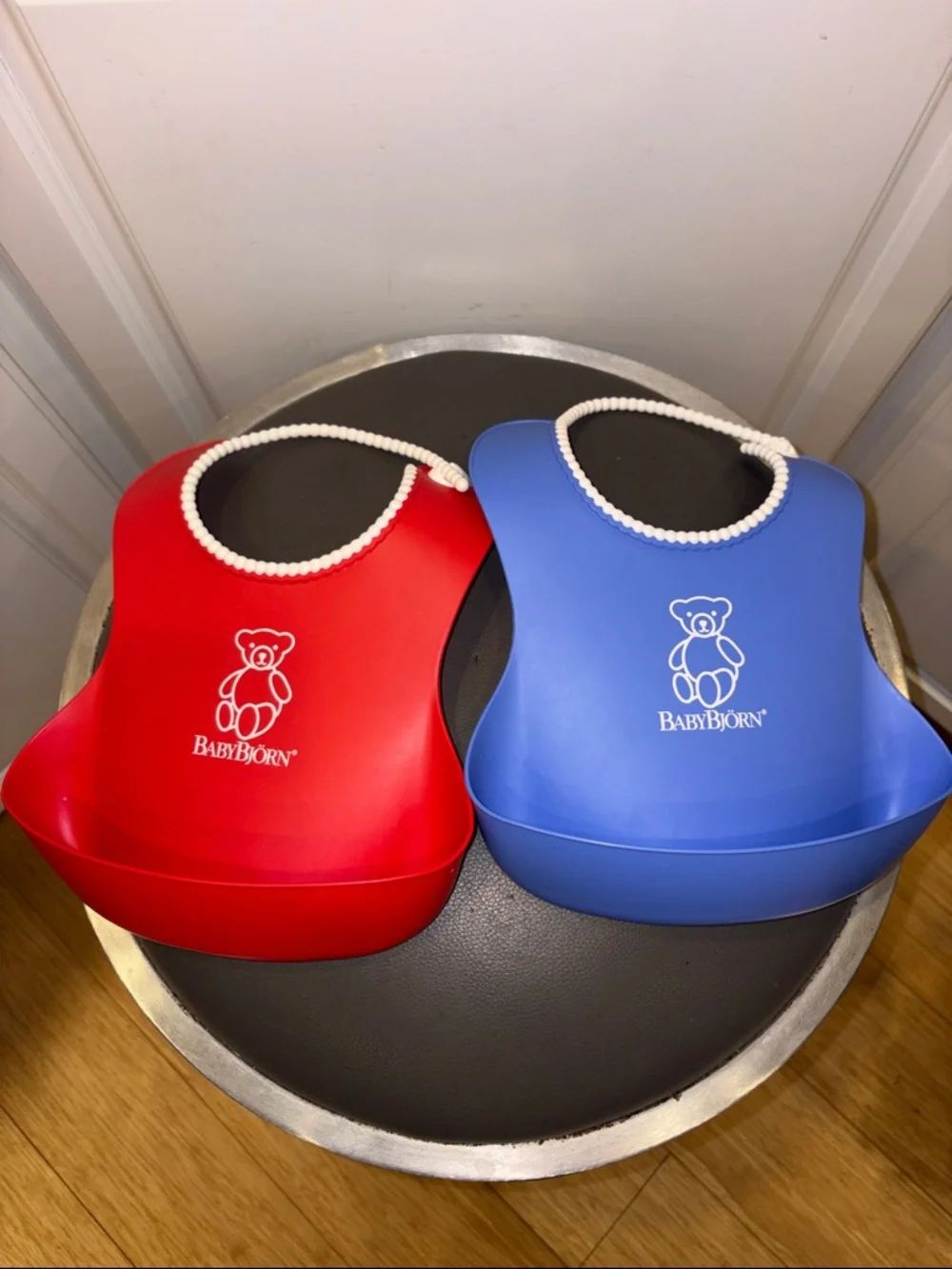 BabyBjörn Soft Silicone Bibs in Blue and Red 2-Pack